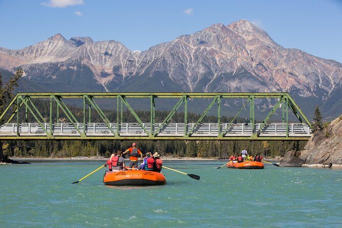 Athabasca River Easy Scenic Raft Trip - Guides in the foreground: safety, humor, and real Jasper context
