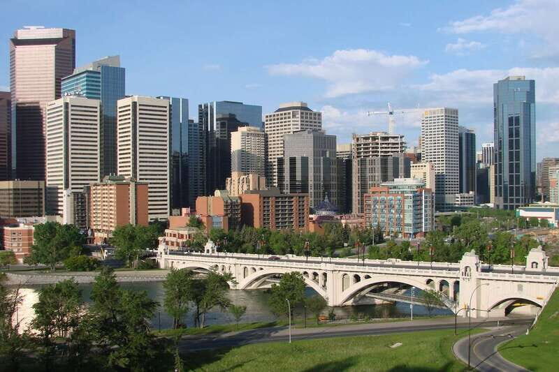 Calgary: 3-Hour Sightseeing Bus Tour - Neighborhood highlights from the bus: East Village, bridges, and Chinatown