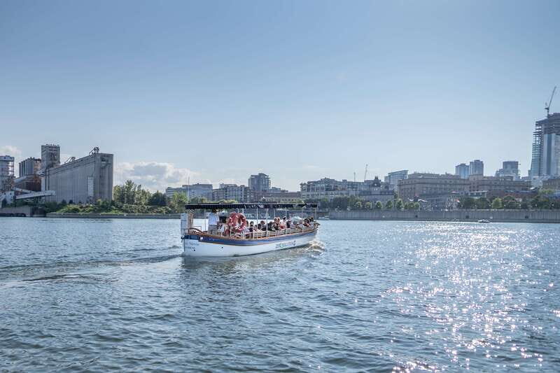 Montreal: Electric Boat Cruise with Onboard Drinks - Yacht Club detour and the Quai de l’Horloge promenade views