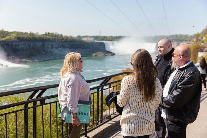 Niagara Falls Tour with Boat Ride & Journey Behind the Falls - Niagara City Cruises boat ride: 19 stories down, then mist up close