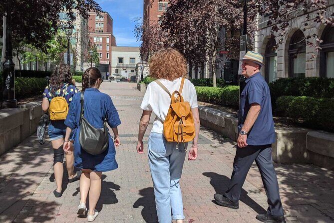 The Original Old Montréal Walking Tour by Guidatour - Place d’Armes, the Royal Bank area, and the story threading French heritage