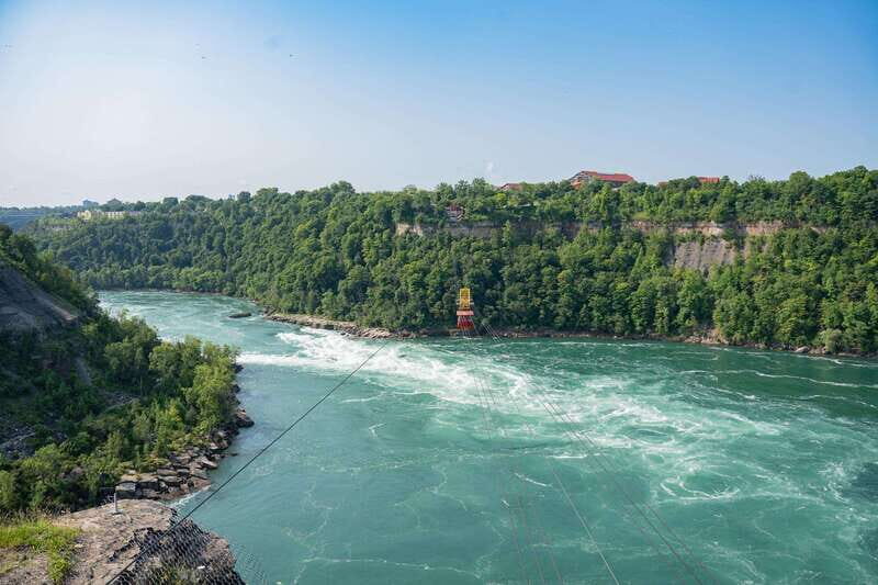 Toronto: Niagara Falls Tour with Cruise and Behind The Falls - Hornblower Cruise at Horseshoe Falls: the misty, photo-first experience