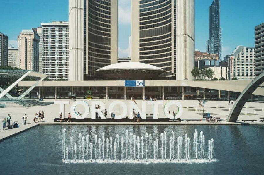 Toronto: Premium Driving Tour with Tower and Harbour Cruise - Starting at the CN Tower: glass elevator, 342m terrace, and the glass floor