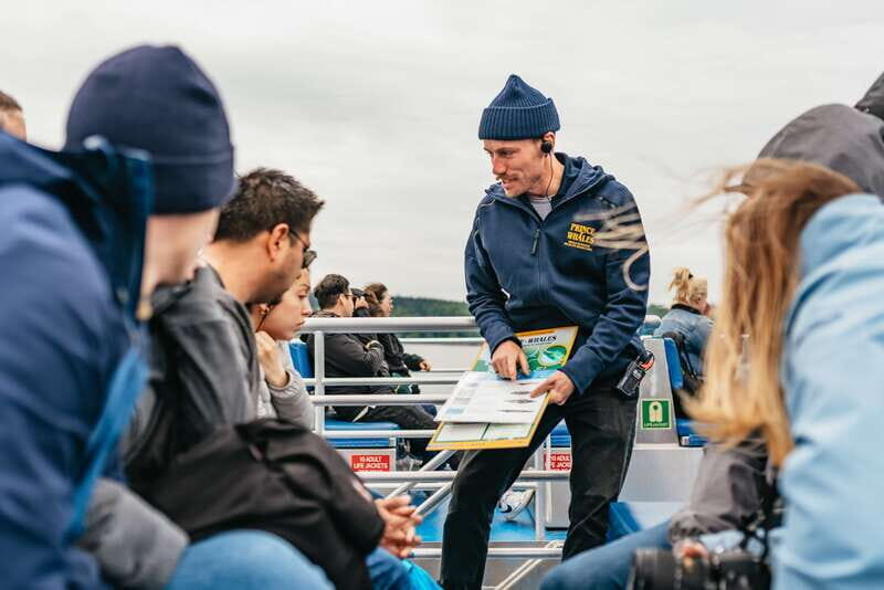 Vancouver: Covered Whale Watching Adventure with Free Photos - The crew’s whale-spotting and marine life lessons (with real ID skills)